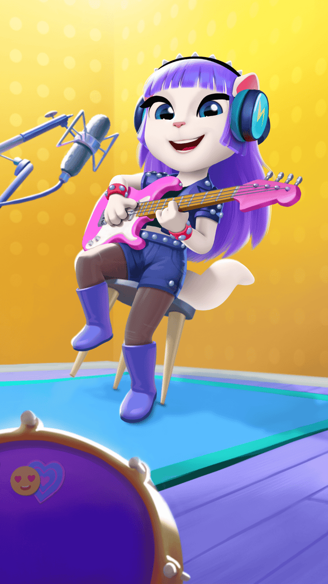 Talking Angela playing an electric guitar inside of My Talking Angela 2 game.