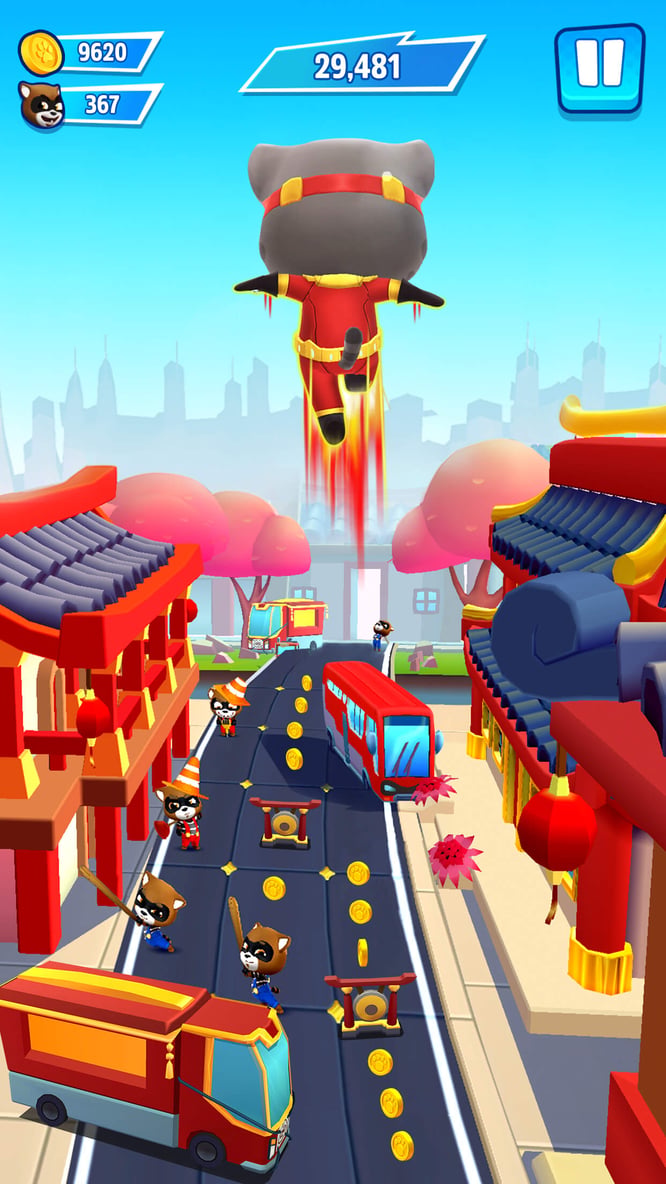 Talking Tom in a hero outfit jumping high inside of Talking Tom Hero Dash game.