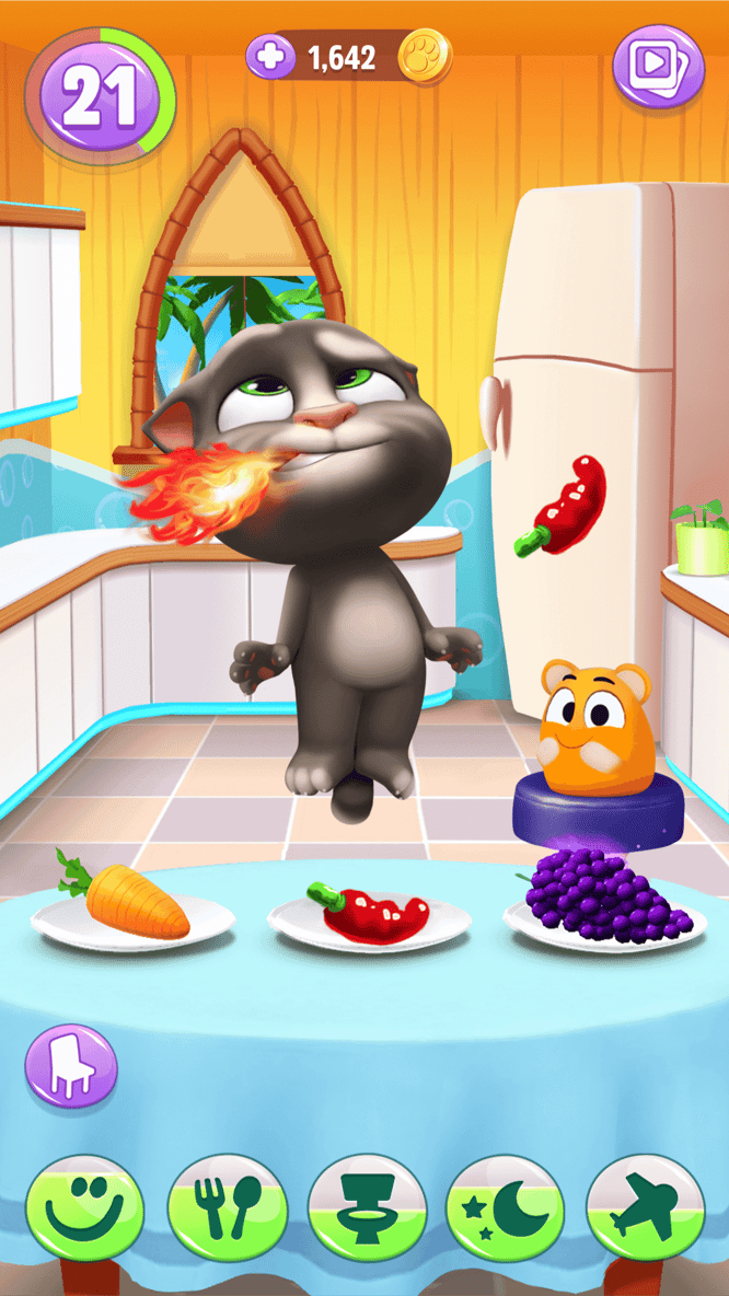 Talking Tom breathing fire from spicy food and a pet chuckling inside of My Talking Tom 2 game.