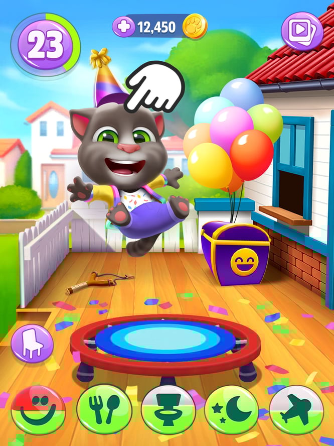 Talking Tom jumping on a trampoline inside of My Talking Tom 2 game.
