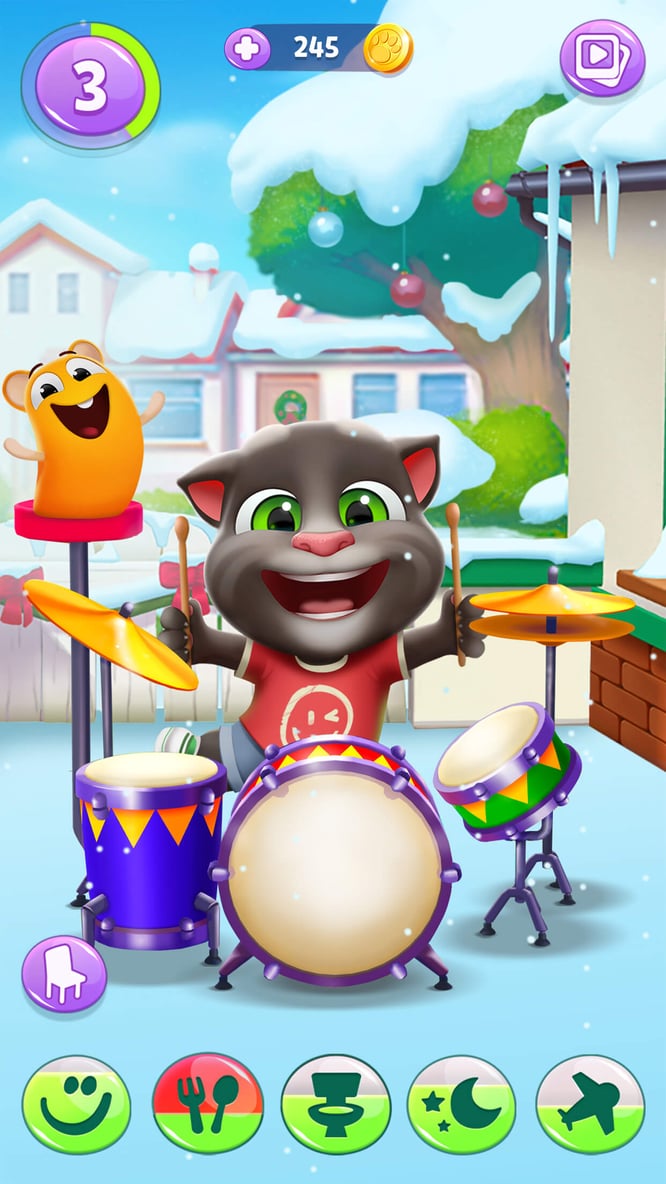 Talking Tom and a pet drumming inside of My Talking Tom 2 game.