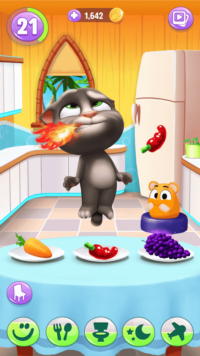 Talking Tom breathing fire from spicy food and a pet chuckling inside of My Talking Tom 2 game.