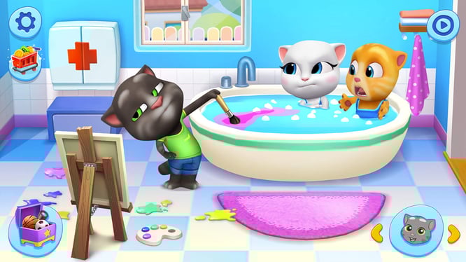 Talking Tom, Talking Angela, and Talking Ginger painting in the bathroom inside of My Talking Tom Friends 2 game.