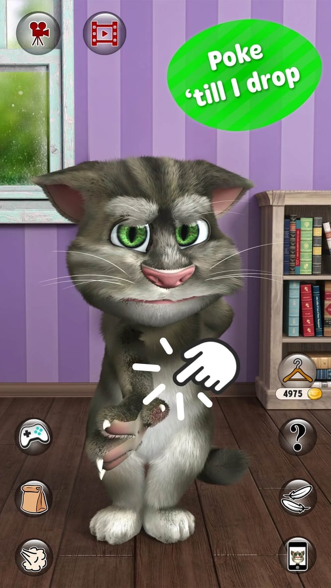 Talking Tom being poked inside of Talking Tom Cat 2 game.