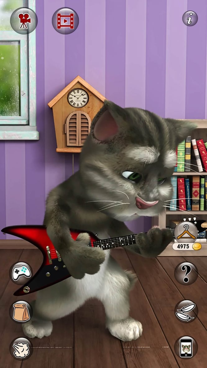 Talking Tom playing an electric guitar inside of Talking Tom Cat 2 game.