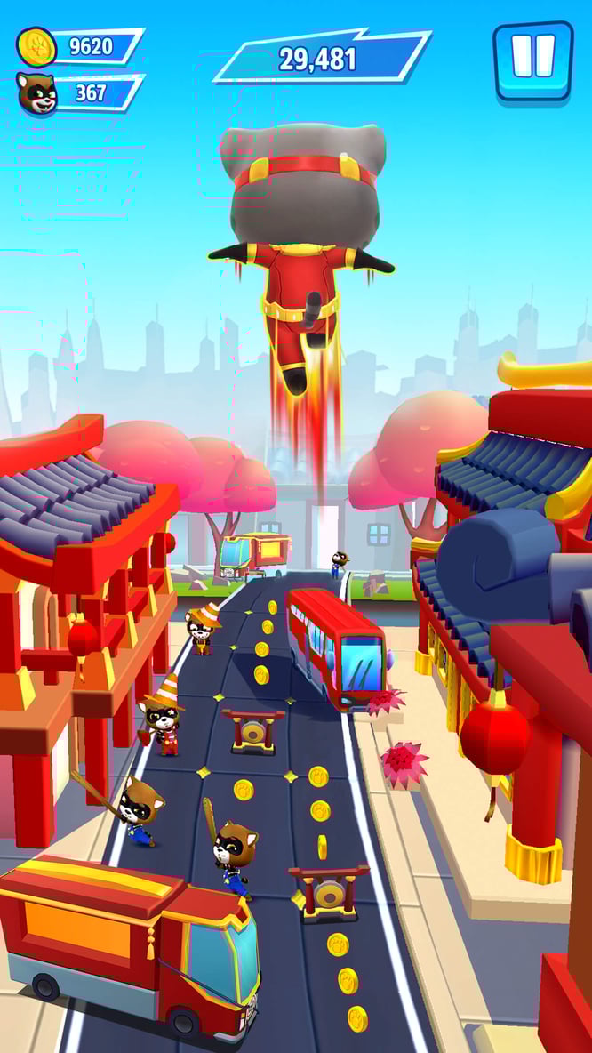 Talking Tom in a hero outfit jumping high inside of Talking Tom Hero Dash game.